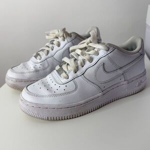Nike Air Force One Grade School Kids’ White Sneakers.